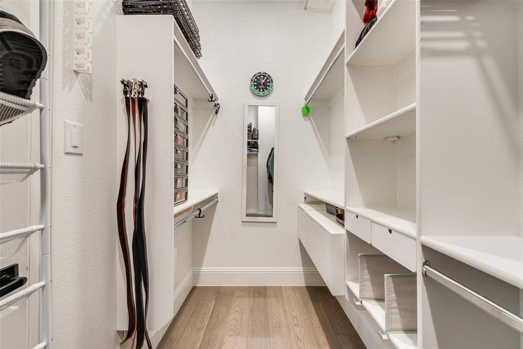 7108 Woodside Drive, Argyle, TX 76226 Primary room HIS closet