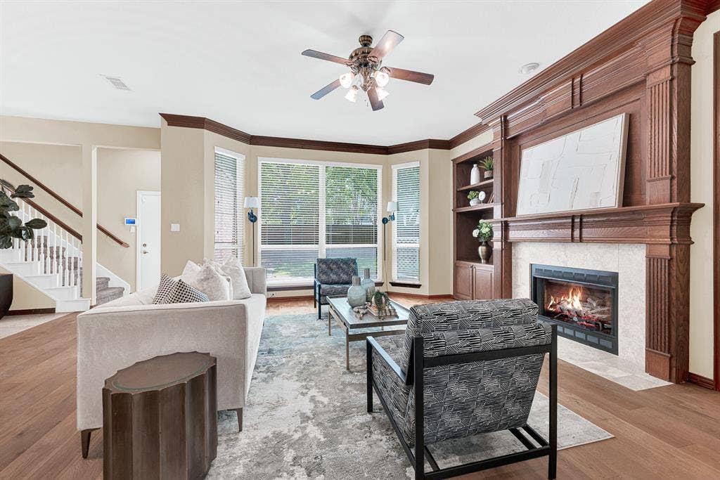 4700 Winter Park Drive, Richardson, TX 75082 Double fluted mantle and wall of windows to the pretty backyard
