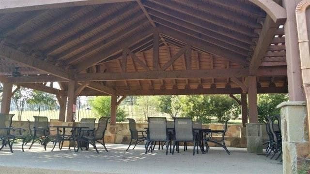 302/303 Lago Vista Drive, Athens, TX 75752 Surrounding community featuring a gazebo, outdoor dining space, and a patio