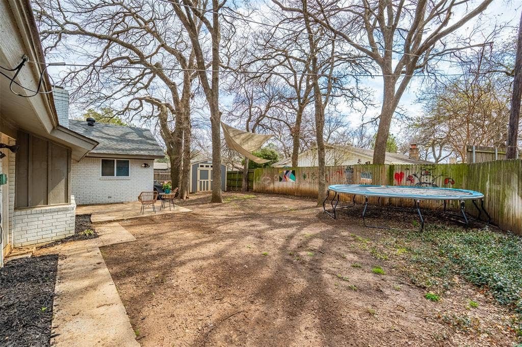 1819 W Cedar Elm Drive, Arlington, TX 76012 Tons of great space for backyard games and running around!