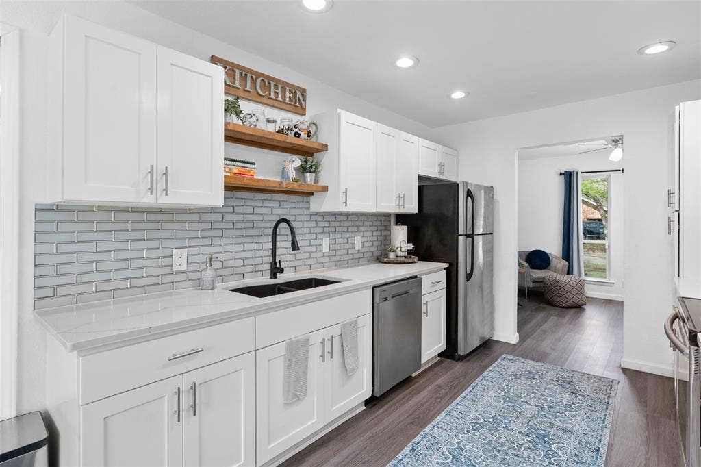1819 W Cedar Elm Drive, Arlington, TX 76012 Recently updated with quartz counters and sleek tile backsplash!