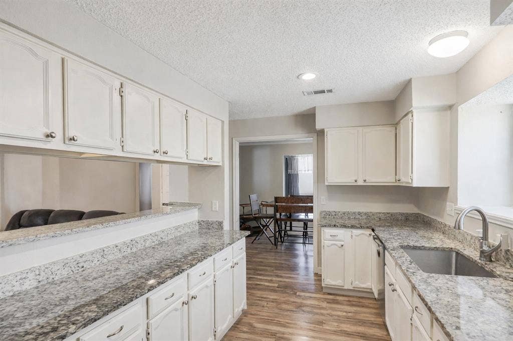 317 Stillmeadow Drive, Garland, TX 75040 With generous counter space and clear sightlines into the main living areas, this kitchen keeps you connected to what matters—whether you’re hosting guests or simply enjoying a night at home.