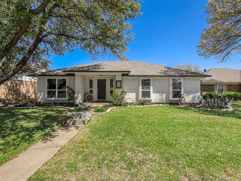 317 Stillmeadow Drive, Garland, TX 75040 From the moment you arrive, there’s a sense of ease. Mature trees offer shade and character, while the welcoming front yard creates a space that feels both open and inviting. The walk to the front door sets the tone—this is a place you’ll look forward to coming home to.