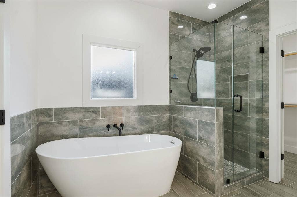 145 Barcelona Street, Payne Springs, TX 75156 primary bath with separate soaking tub and shower