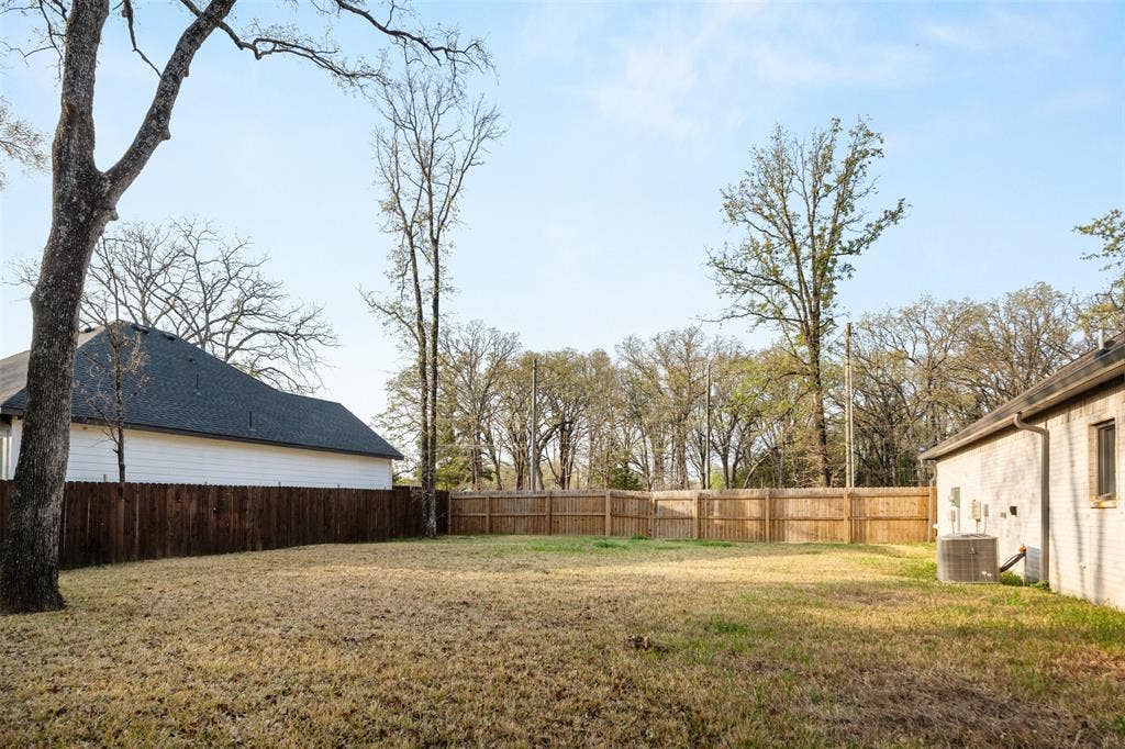 145 Barcelona Street, Payne Springs, TX 75156 Extra lot fenced to make large backyard.