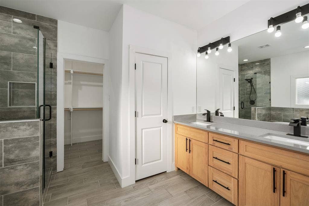 145 Barcelona Street, Payne Springs, TX 75156 Primary bath with dual sinks, shower and large walk in closet