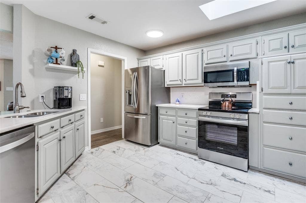 5 Huckleberry Lane, Star Harbor, TX 75148 Updated Kitchen with Skylight