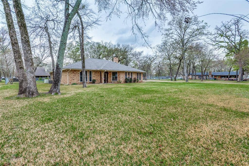 5 Huckleberry Lane, Star Harbor, TX 75148 Front of Home with Large 3-Lot Yard