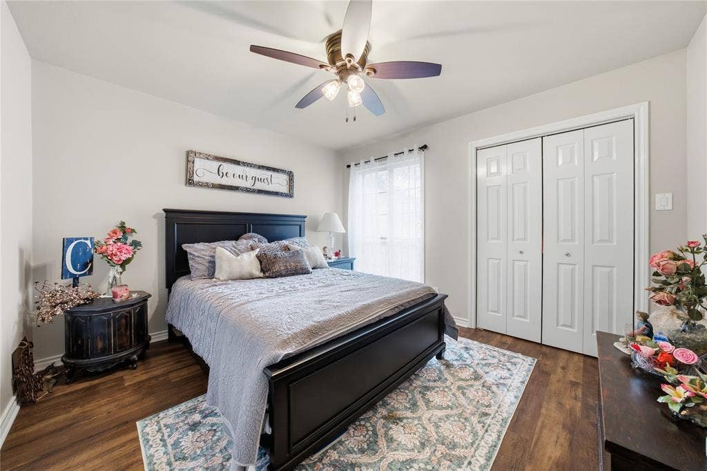 820 Torribrooke Lane, Athens, TX 75751 Bedroom featuring dark wood-style floors, ceiling fan, and a closet
