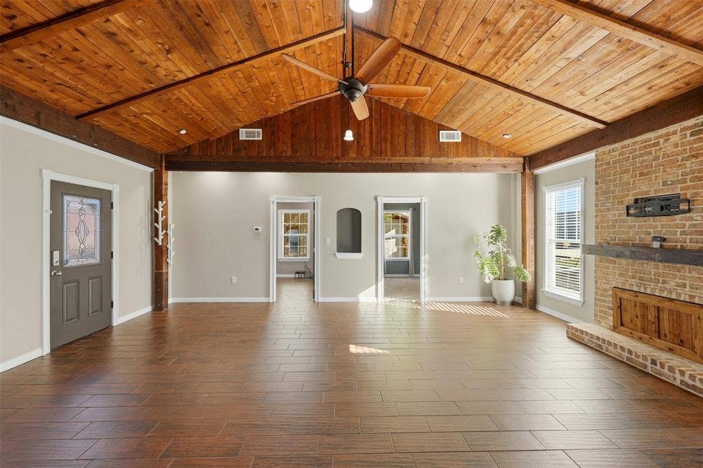113 Mulkey Road, Waxahachie, TX 75167 living room with a wood ceiling with exposed beams, ceiling fan, and wood tiled floors