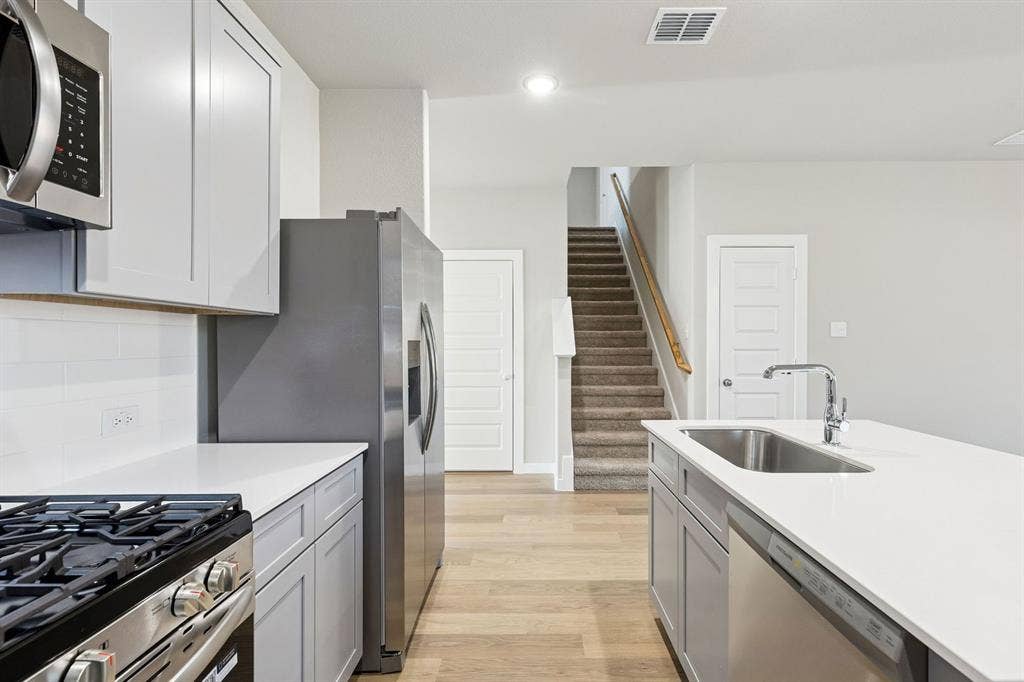 3603 High Valley Drive, Princeton, TX 75071 Kitchen in the Haylee home plan by Trophy Signature Homes - REPRESENTATIVE PHOTO
