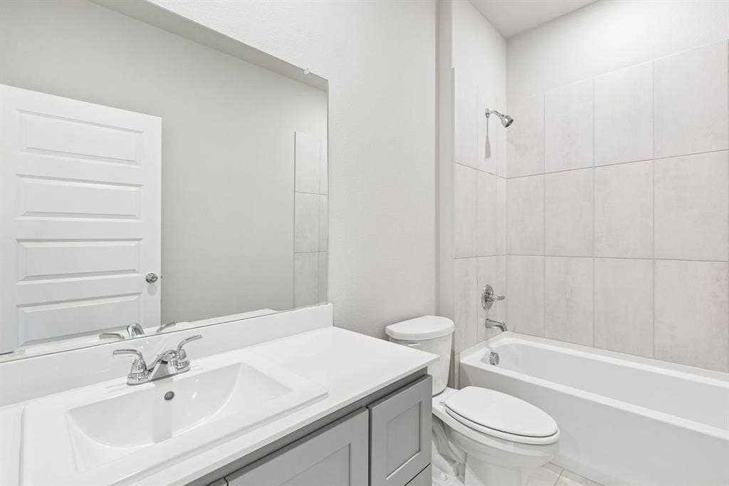 3603 High Valley Drive, Princeton, TX 75071 Bathroom in the Haylee home plan by Trophy Signature Homes - REPRESENTATIVE PHOTO