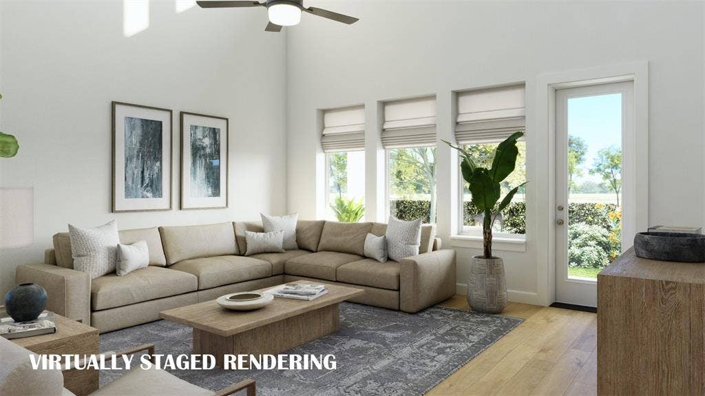 8763 Battlement Road, Frisco, TX 75035 A spacious and light filled family room is the perfect place place for friends and family to gather. VIRTUALLY STAGED RENDERING