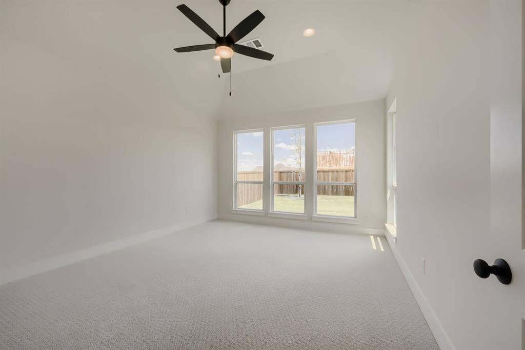 1241 Greenbriar Avenue, Haslet, TX 76052 Bright interior with vaulted ceiling and light carpeting