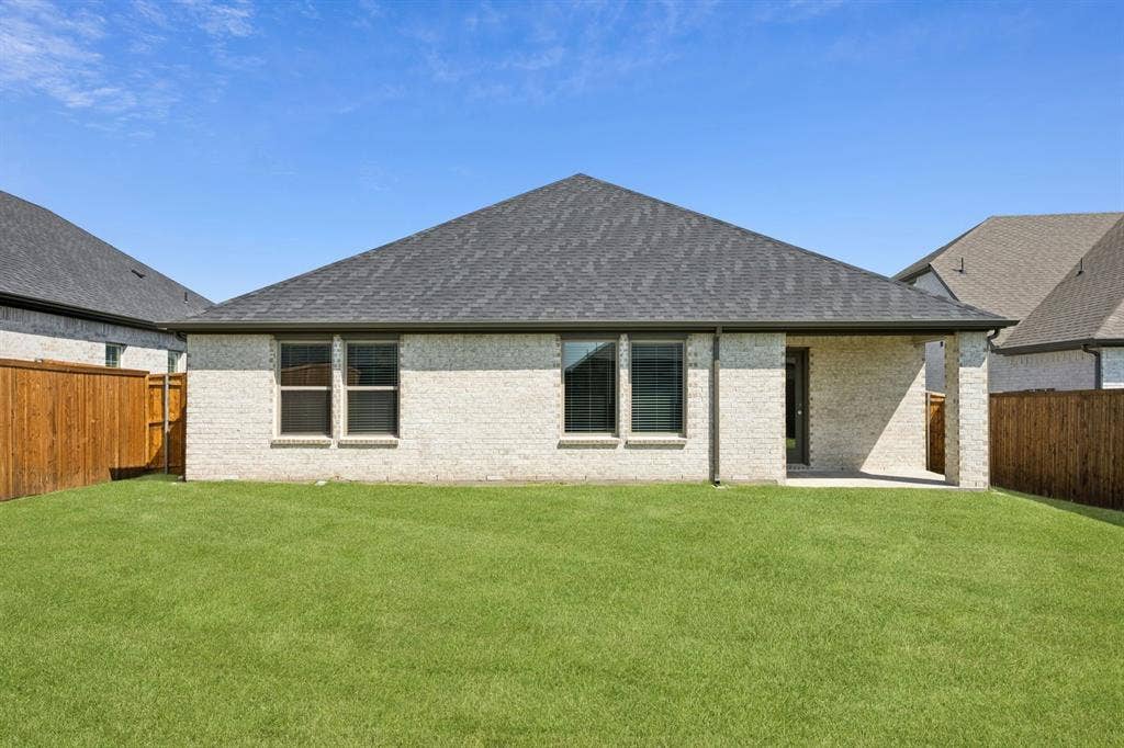 201 Bright Alcove Court, Lavon, TX 75166 Covered Patio in the Heisman home plan by Trophy Signature Homes – REPRESENTATIVE PHOTO