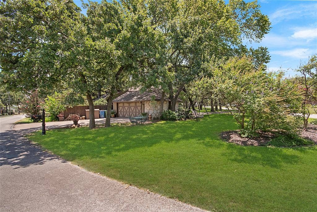 3526 Lakeridge Drive, Grapevine, TX 76051 This home has both a front and back garage entry