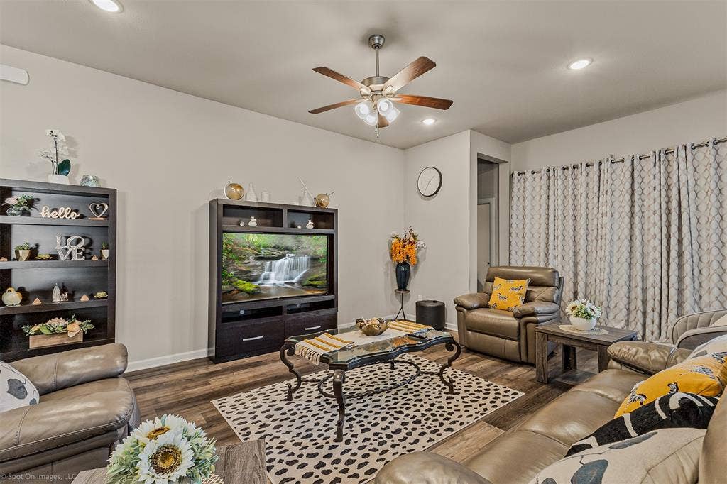 5408 Wedge Wood Drive, Haltom City, TX 76137 Living area featuring dark wood-style flooring, recessed lighting, and ceiling fan