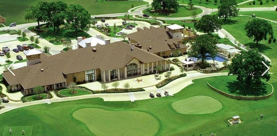 351 Southern Hills Drive, Fairview, TX 75069 Expansive golf course setting featuring manicured greens, a clubhouse with multiple wings, a central courtyard, and an outdoor pool area