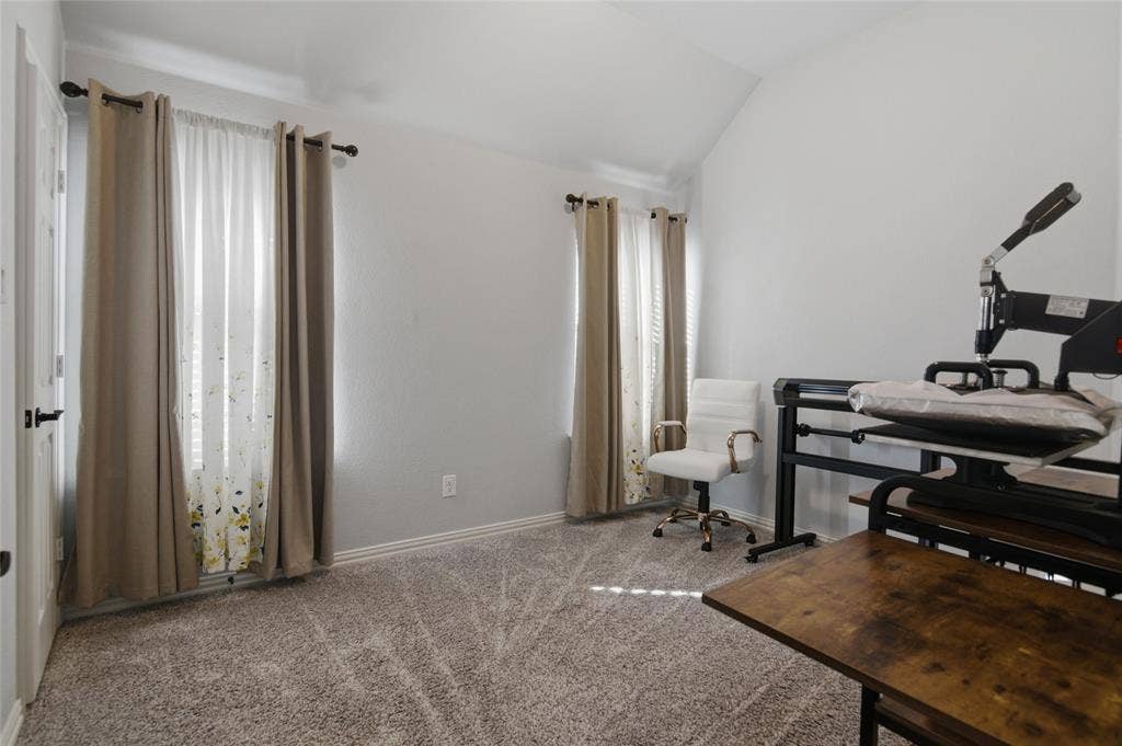 Bedroom #4 being utilized as a crafting room. Has a closet also.