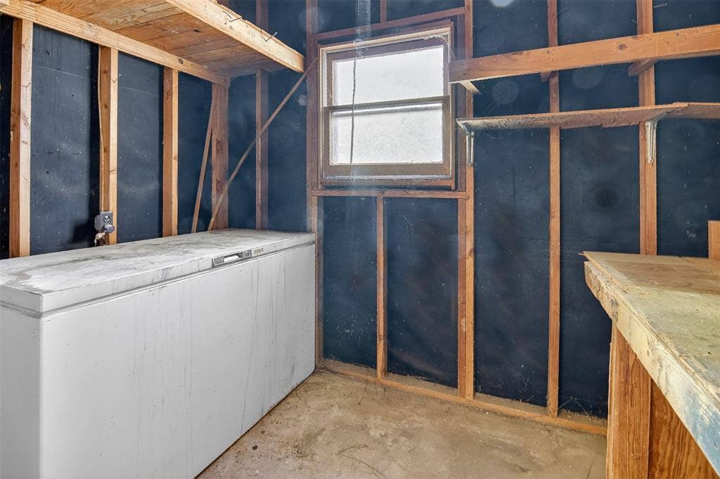 1224 S Brazos Street, Weatherford, TX 76086 View of storage room with electricity.