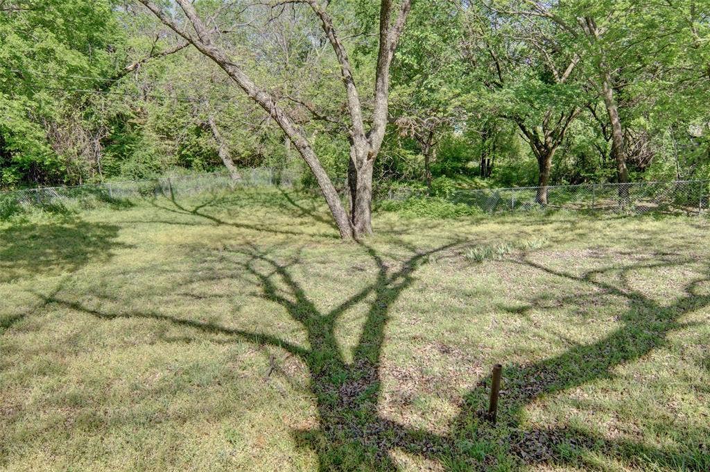 1224 S Brazos Street, Weatherford, TX 76086 View of large backyard.