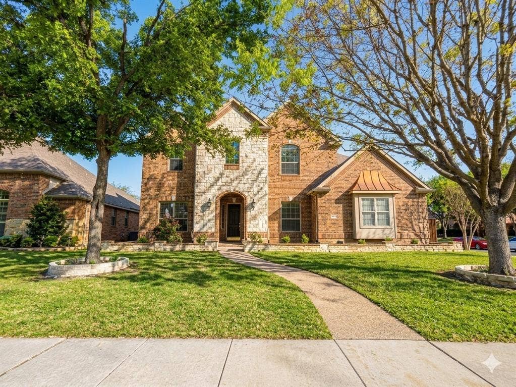 15031 Woodbluff Drive, Frisco, TX 75035 Brick and stone exterior with arched entry