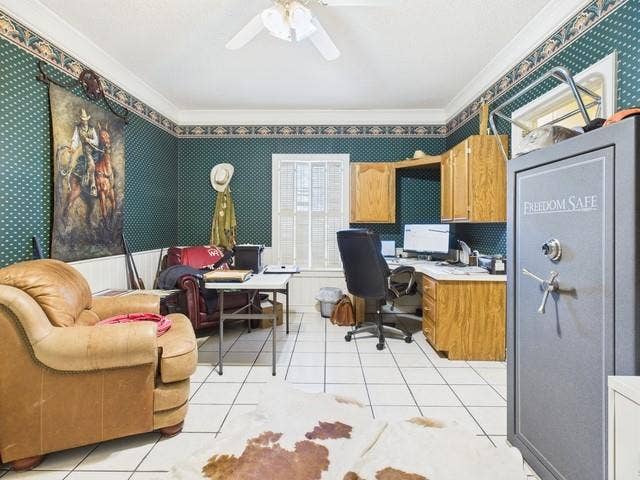 2382 Crystal Drive, Athens, TX 75752 Home office with wallpapered walls, crown molding, light tile patterned floors, and ceiling fan
