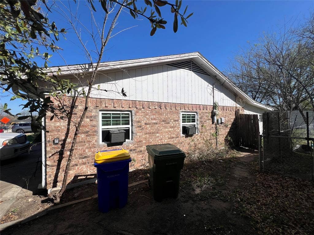 6036 Harrison Way, Watauga, TX 76148 View of side of home