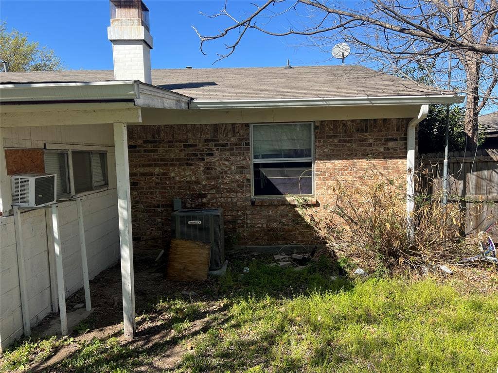 6036 Harrison Way, Watauga, TX 76148 View of property exterior featuring a chimney, roof with shingles, and cooling unit