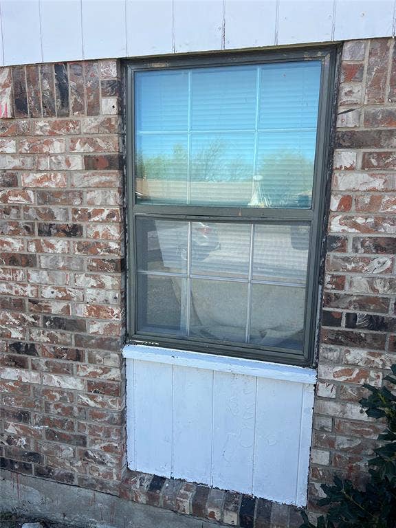 6036 Harrison Way, Watauga, TX 76148 Exterior view of brick siding