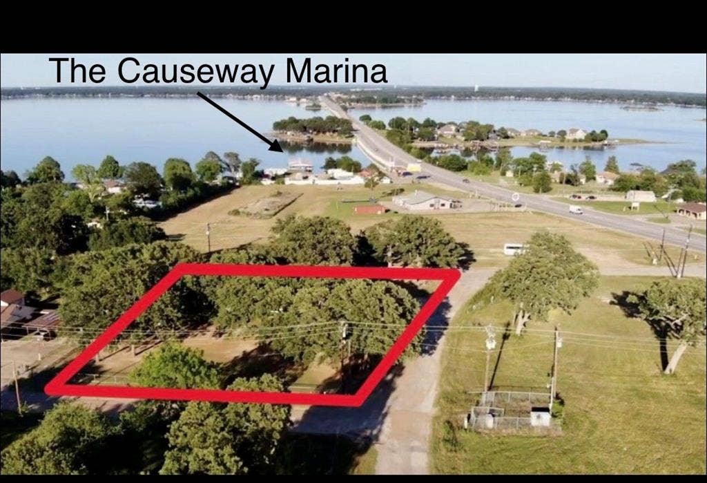 Double corner lot steps from the marina!