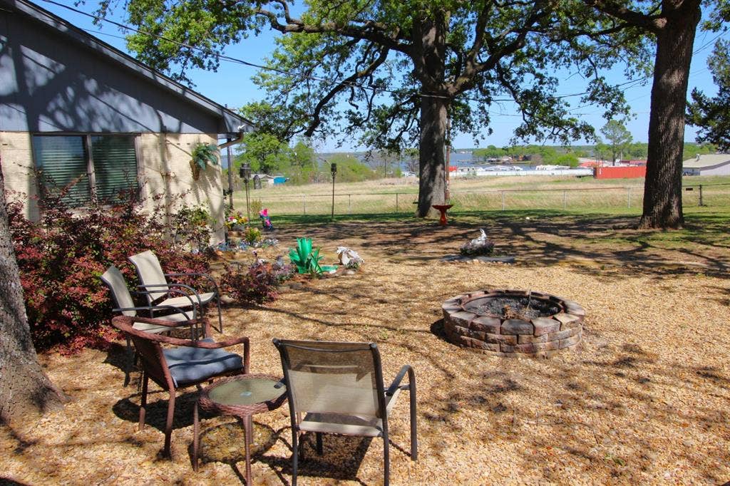 South side fire pit seating area over looking the lake