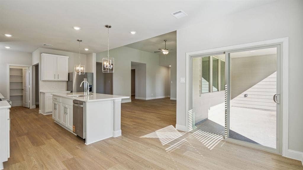 1410 Winters Way, Princeton, TX 75071 Photo is not of the actual home, but is an inspirational photo of builder’s model home and may depict options, furnishings, and/or decorator features that are not included.
