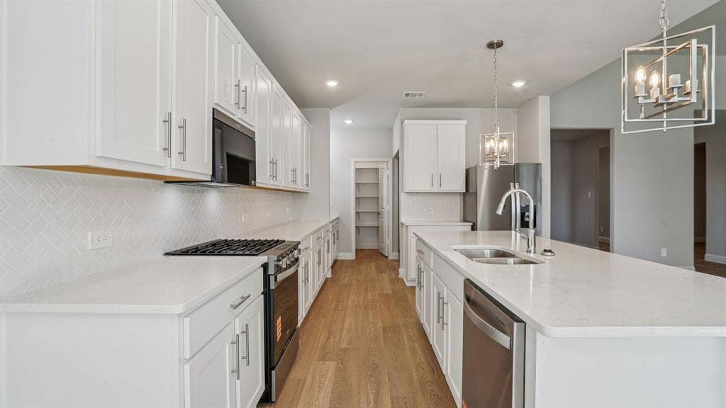 1410 Winters Way, Princeton, TX 75071 Photo is not of the actual home, but is an inspirational photo of builder’s model home and may depict options, furnishings, and/or decorator features that are not included.