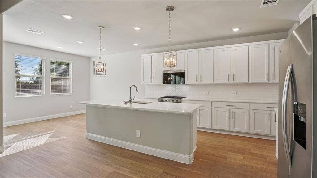1410 Winters Way, Princeton, TX 75071 Photo is not of the actual home, but is an inspirational photo of builder’s model home and may depict options, furnishings, and/or decorator features that are not included.