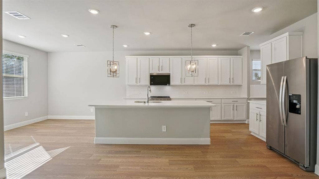 1410 Winters Way, Princeton, TX 75071 Photo is not of the actual home, but is an inspirational photo of builder’s model home and may depict options, furnishings, and/or decorator features that are not included.