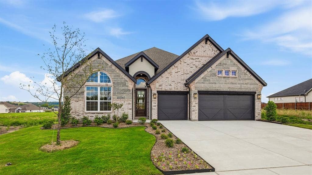 331 Fire Blade Drive, Aledo, TX 76008 Contemporary brick and stone exterior with dark trim accents