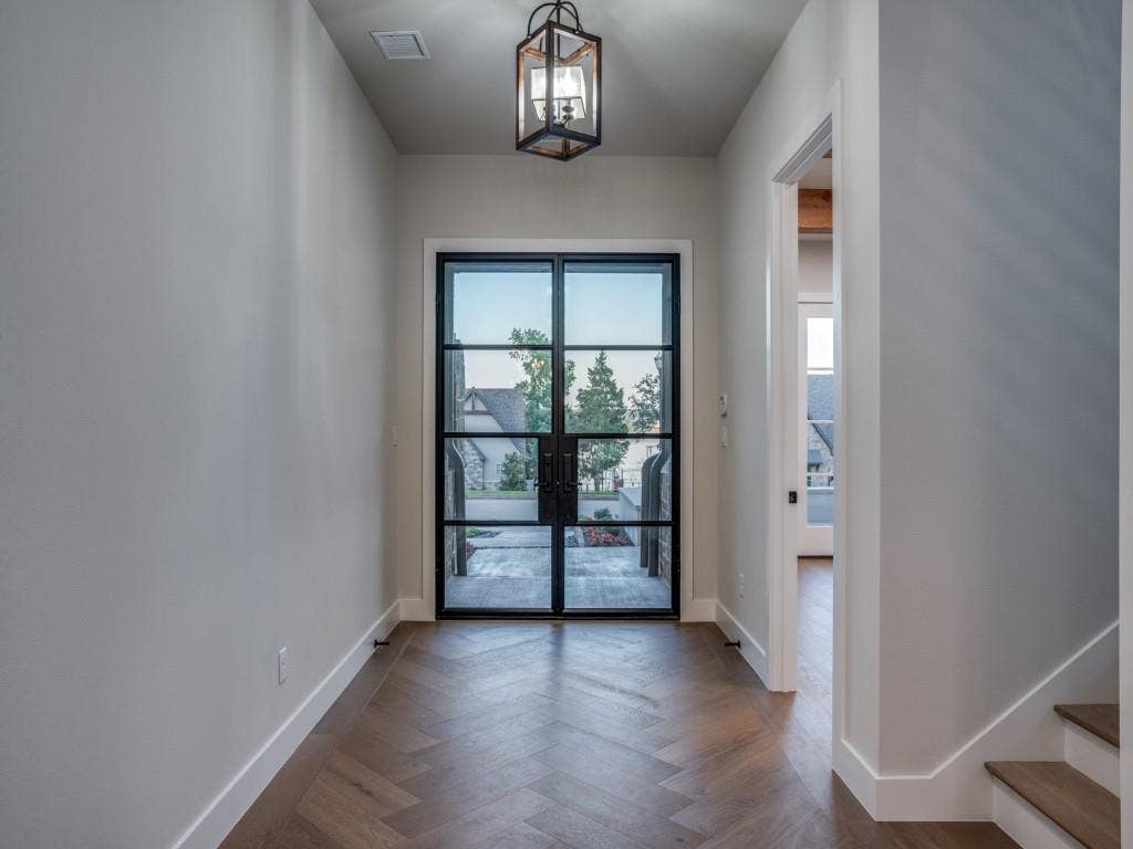 2424 Bellview Circle, Tyler, TX 75709 Herringbone flooring welcomes everyone.