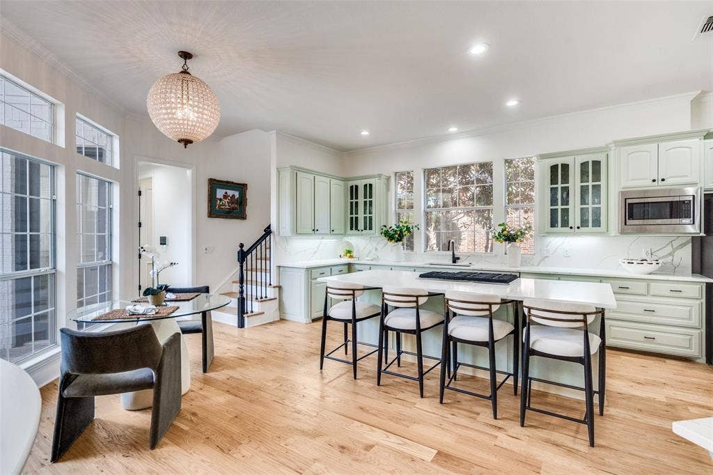 Cozy breakfast nook and additonal staircase for easy access to the upstairs bedrooms.