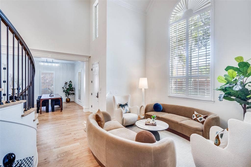 Formal living room offers extra space for entertanining.