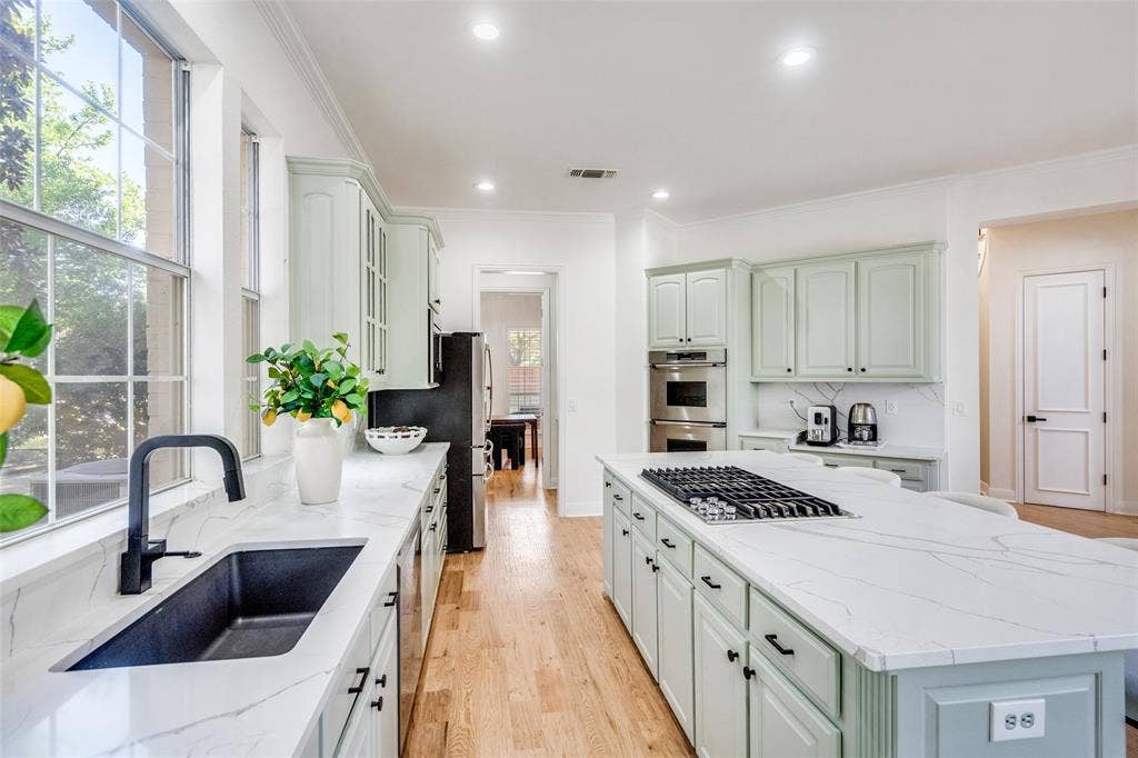 Stunning kitchen with large island and farmhouse sink!