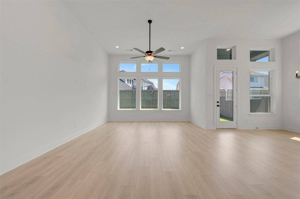 1709 Drover Street, Northlake, TX 76247 Spacious interior with wood-finish flooring, high ceilings, and recessed lighting