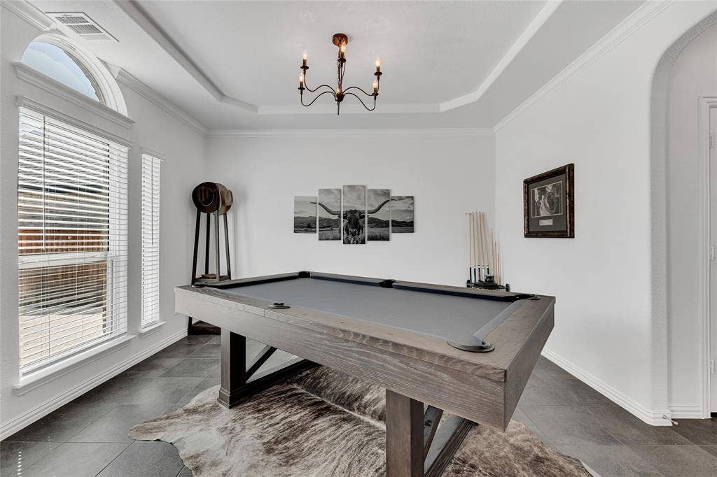 566 Long Meadow Drive, Haslet, TX 76052 This is formal dining being used as a game room.