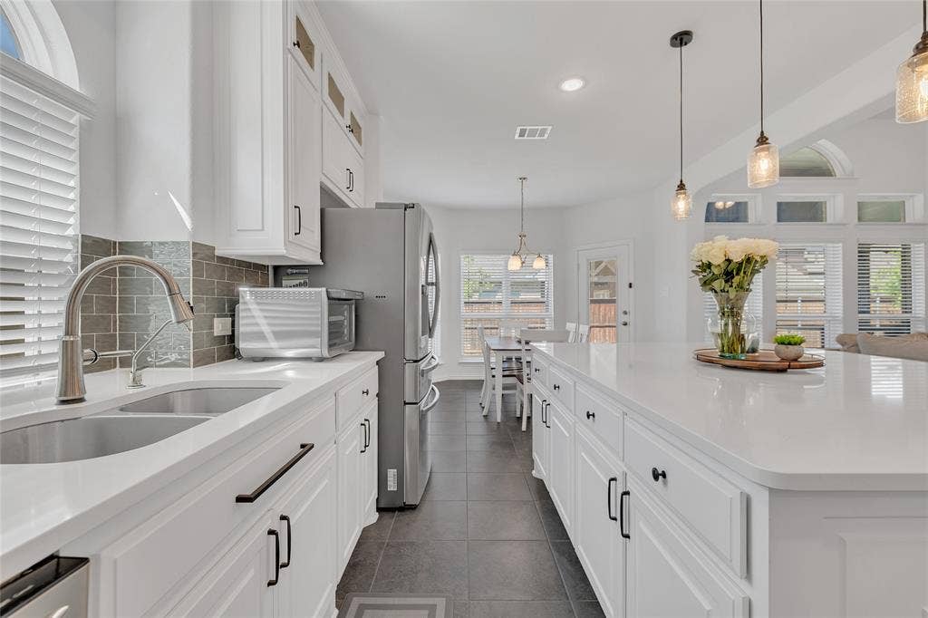 566 Long Meadow Drive, Haslet, TX 76052 Cabinet hardware is already tastefully completed for you