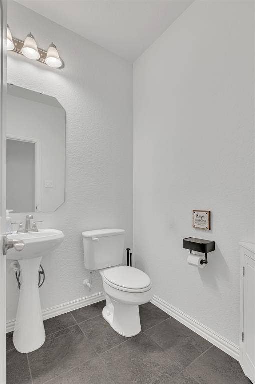 566 Long Meadow Drive, Haslet, TX 76052 First floor half bath for guests.