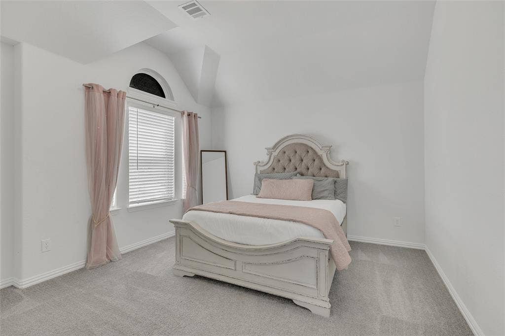 566 Long Meadow Drive, Haslet, TX 76052 Bedroom #3. This bedroom is upstairs and that IS a queen size bed, for reference!