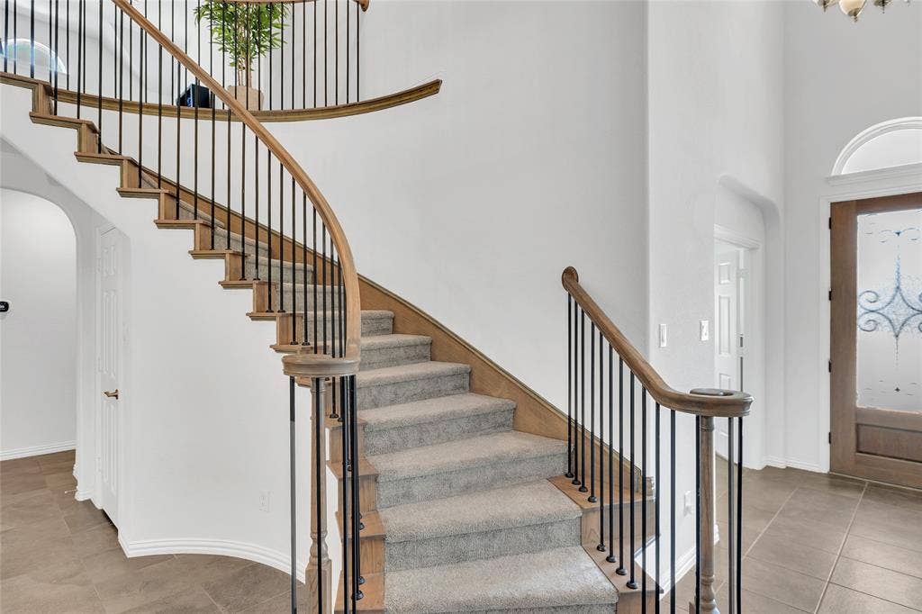 566 Long Meadow Drive, Haslet, TX 76052 Spiral staircase screams luxurious