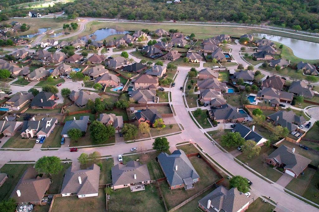 349 Creekside Trail, Argyle, TX 76226 Aerial view of property's location featuring a large body of water and nearby suburban area
