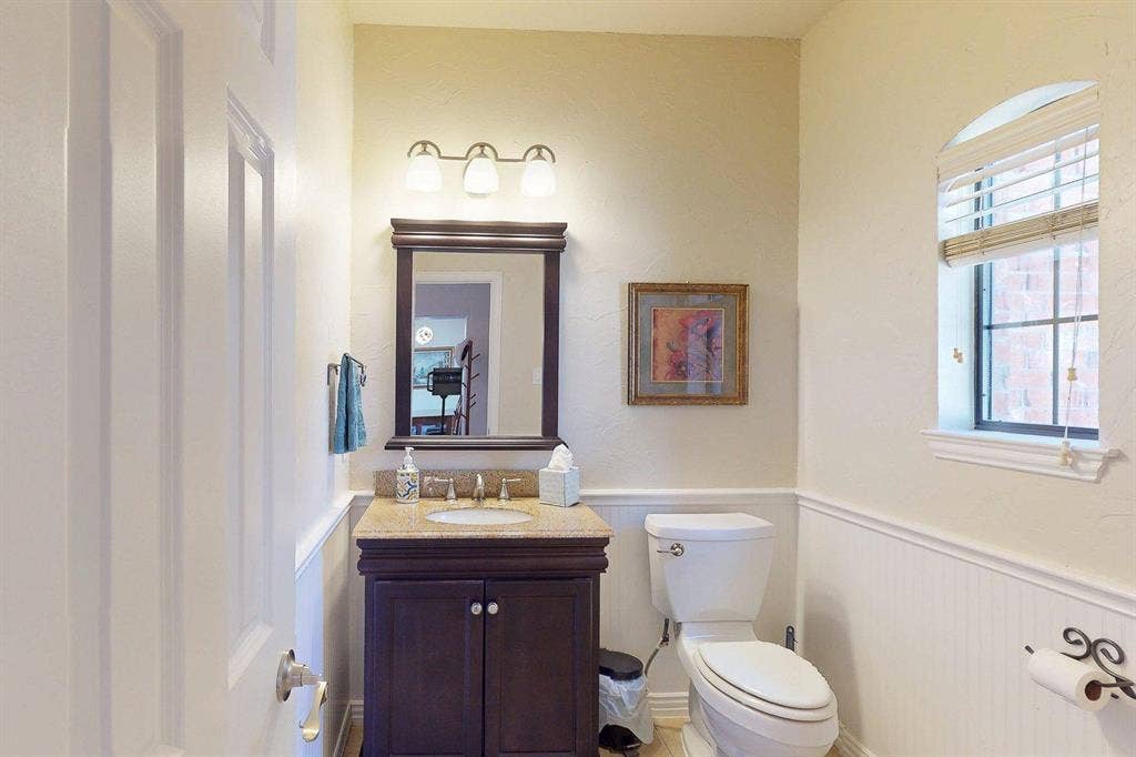 349 Creekside Trail, Argyle, TX 76226 Half bathroom featuring wainscoting and vanity