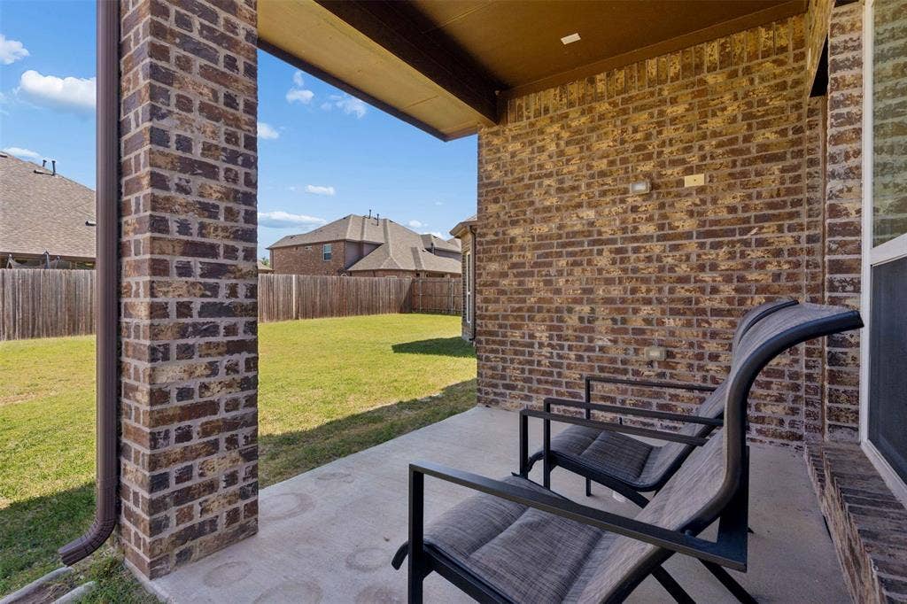 2446 Old Stables Drive, Celina, TX 75009 Fenced backyard with a patio area